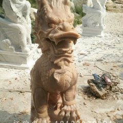 踩球麒麟雕塑，晚霞紅麒麟石雕