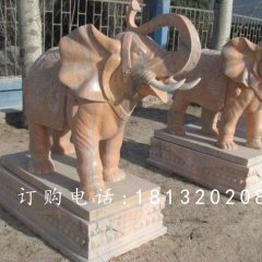 象鼻向上大象石雕，晚霞紅大象雕塑